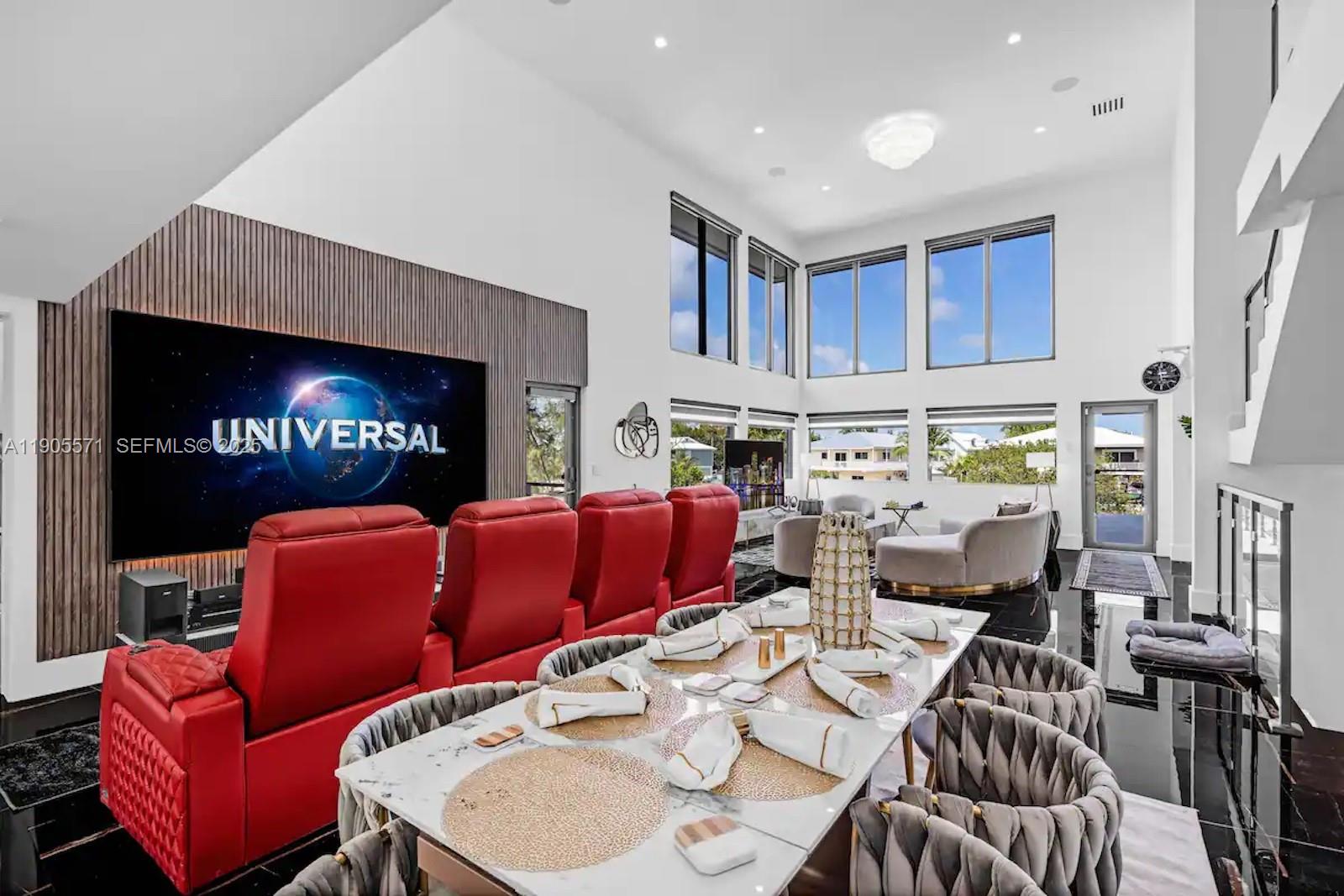32 North Bounty Lane, Unit 32 Key Largo, FL 33037 - Photo 13 of 55 a living room with furniture fireplace and a flat screen tv