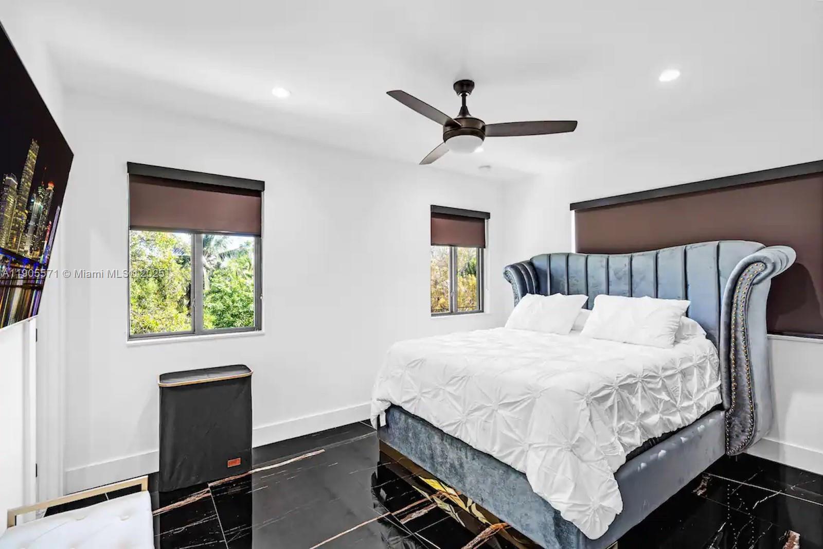 32 North Bounty Lane, Unit 32 Key Largo, FL 33037 - Photo 31 of 55 a bedroom with a bed and a window