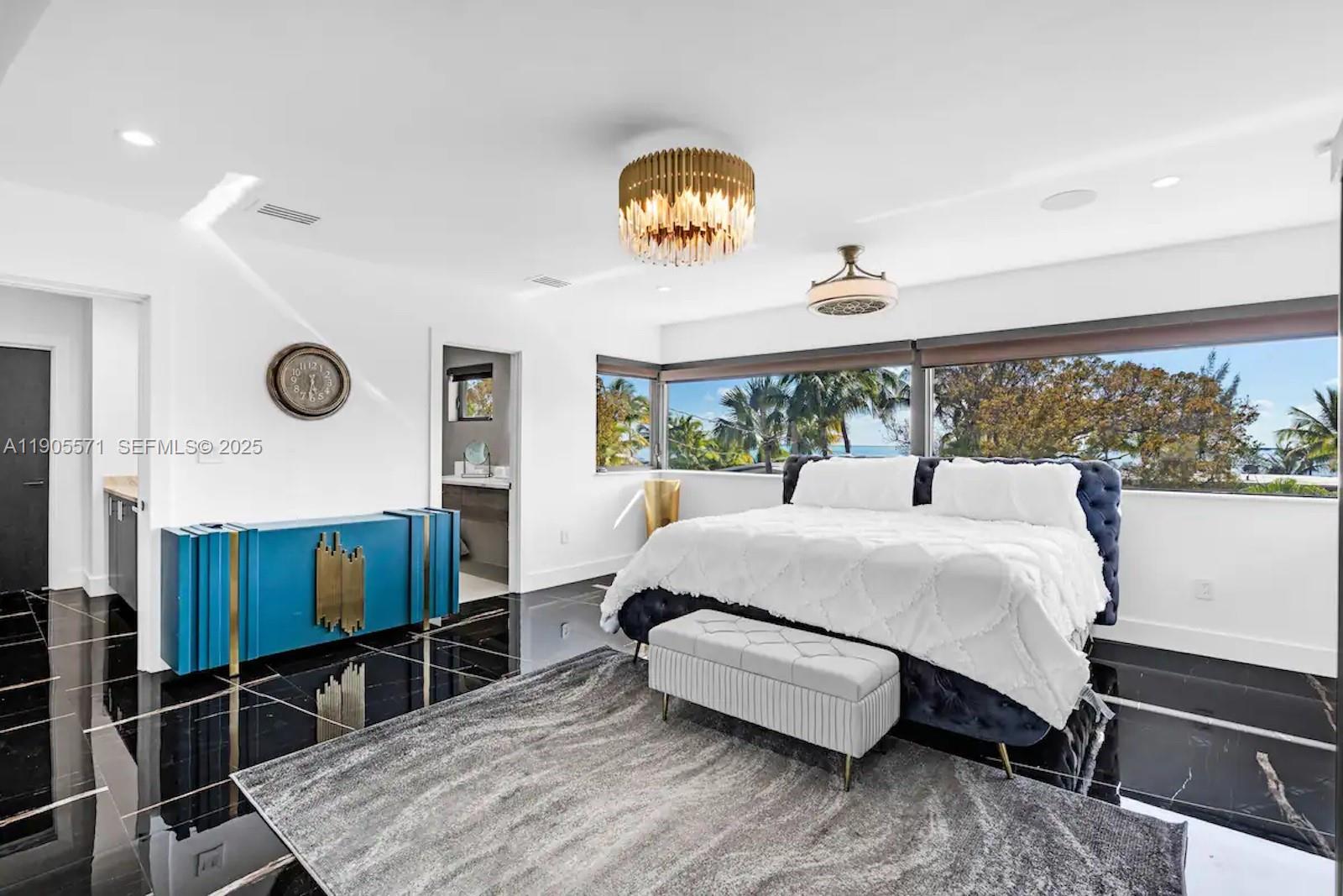 32 North Bounty Lane, Unit 32 Key Largo, FL 33037 - Photo 35 of 55 a bedroom with a bed and window