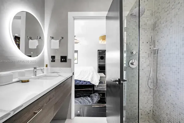 a room with furniture and a large window