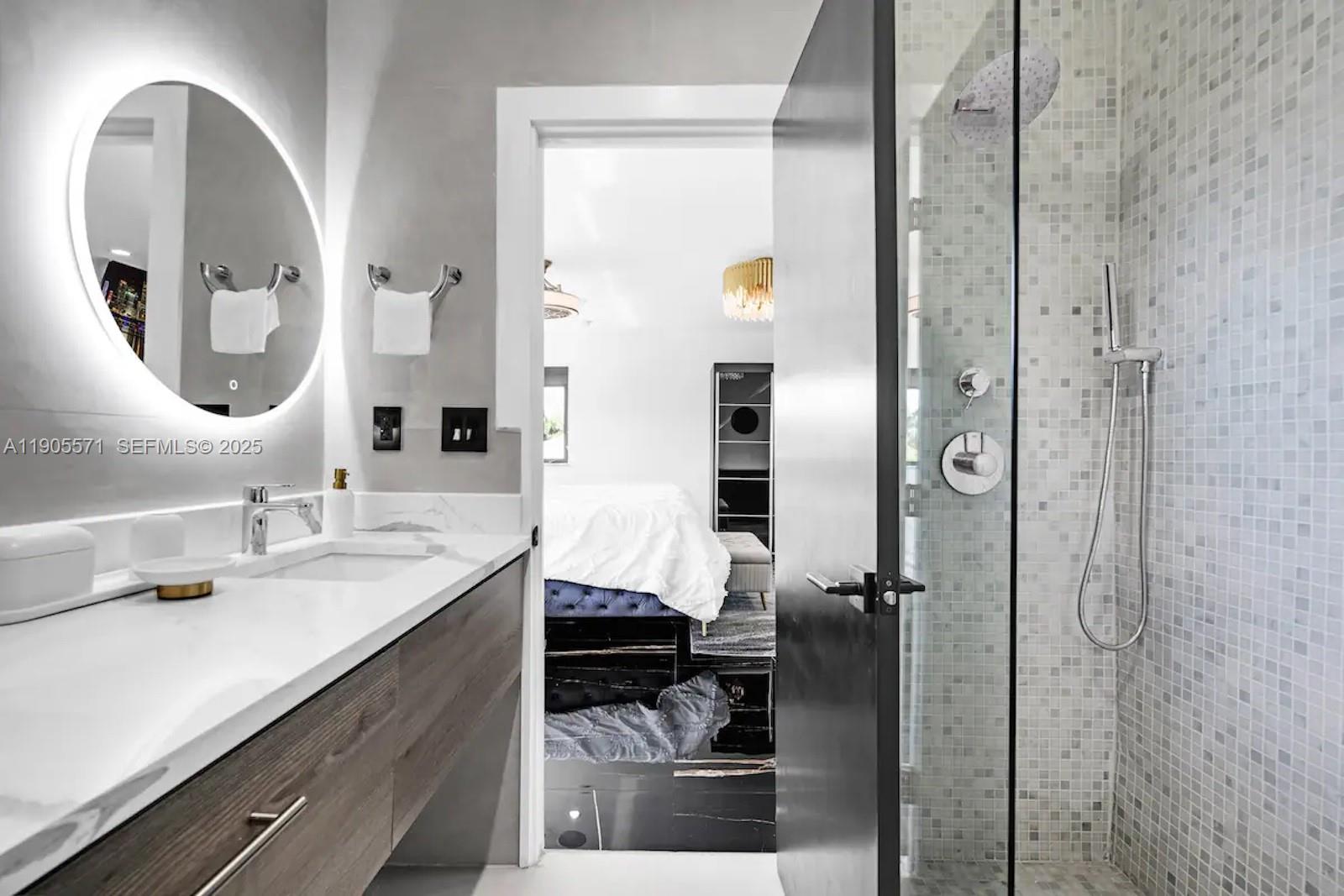 32 North Bounty Lane, Unit 32 Key Largo, FL 33037 - Photo 38 of 55 a bathroom with a sink and a mirror