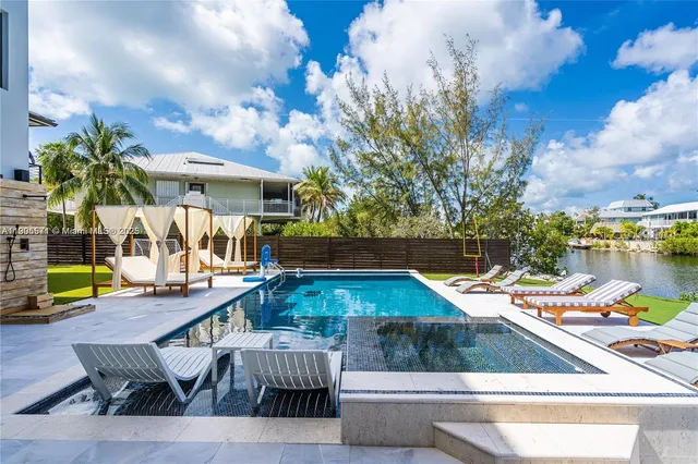 a living room with furniture and window