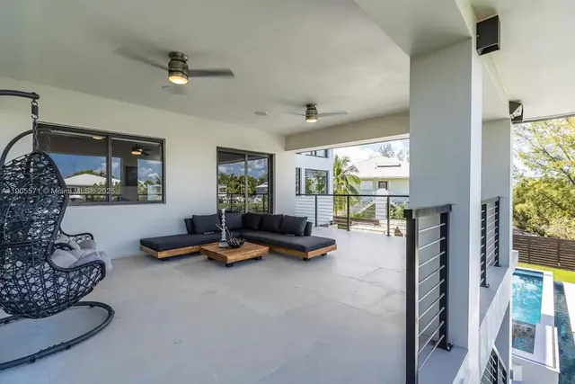 a view of a dining area with furniture window and outside view
