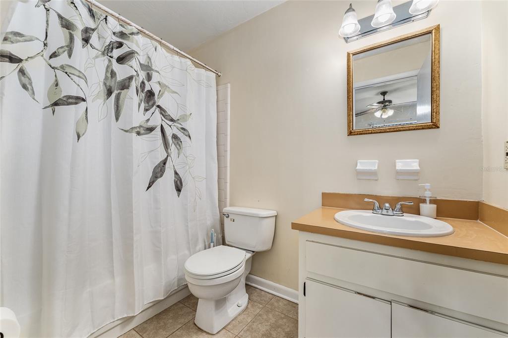 2635 Southwest 35th Place, Unit 604 Gainesville, FL 32608 - Photo 16 of 28 a bathroom with a toilet and a sink