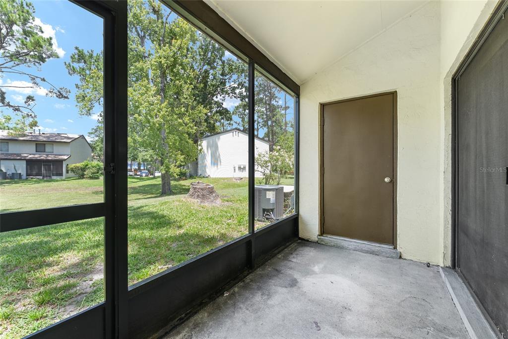 2635 Southwest 35th Place, Unit 604 Gainesville, FL 32608 - Photo 24 of 28 a view of a room that has a large window