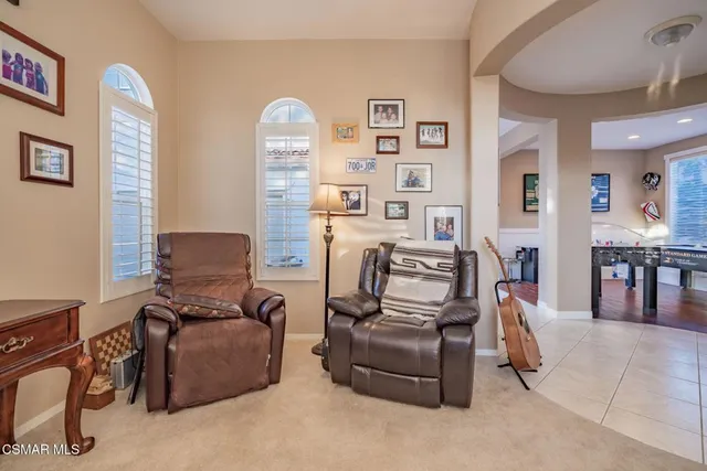 a view of a workspace with furniture