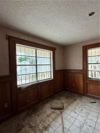 a view of swimming pool with a patio