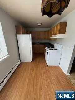 a view of kitchen and utility room