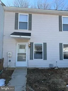 a front view of a house with yard