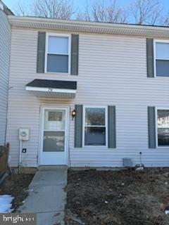 a front view of a house with yard