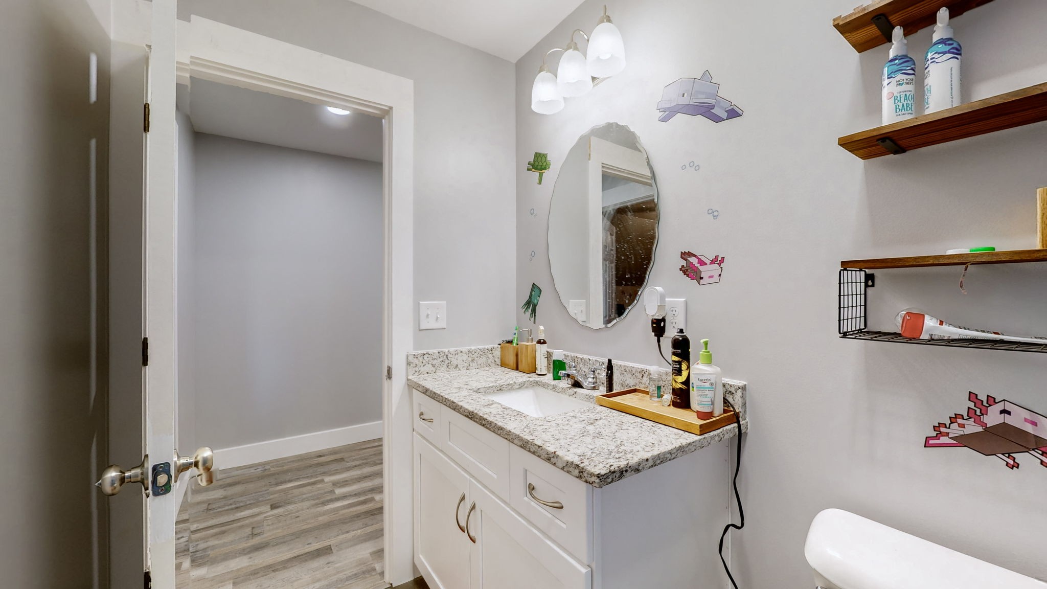 3310 Rocky Branch Road Watertown, TN 37184 - Photo 22 of 52 a bathroom with a sink vanity mirror and toilet