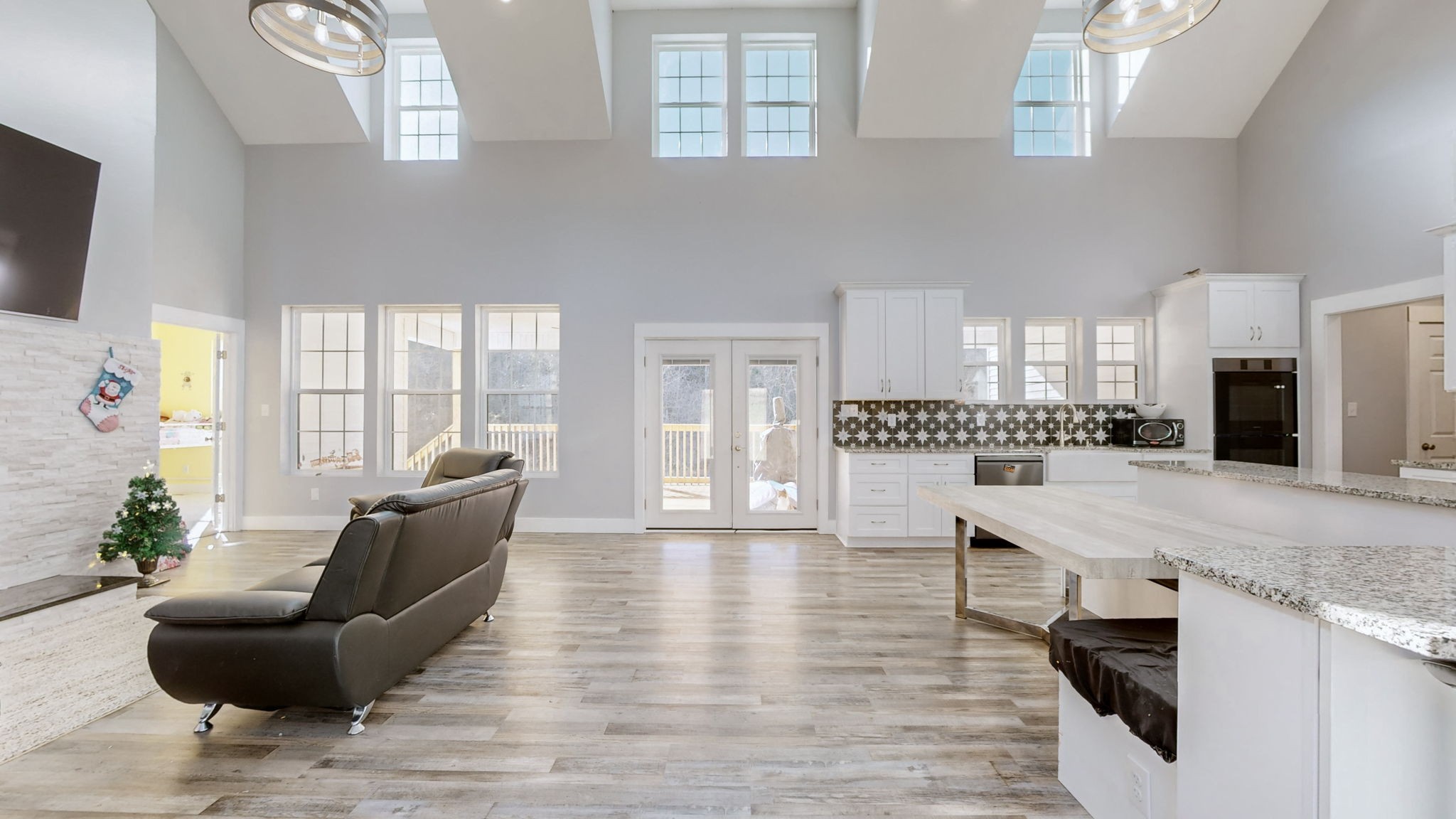 3310 Rocky Branch Road Watertown, TN 37184 - Photo 4 of 52 a living room with furniture wooden floor and a flat screen tv