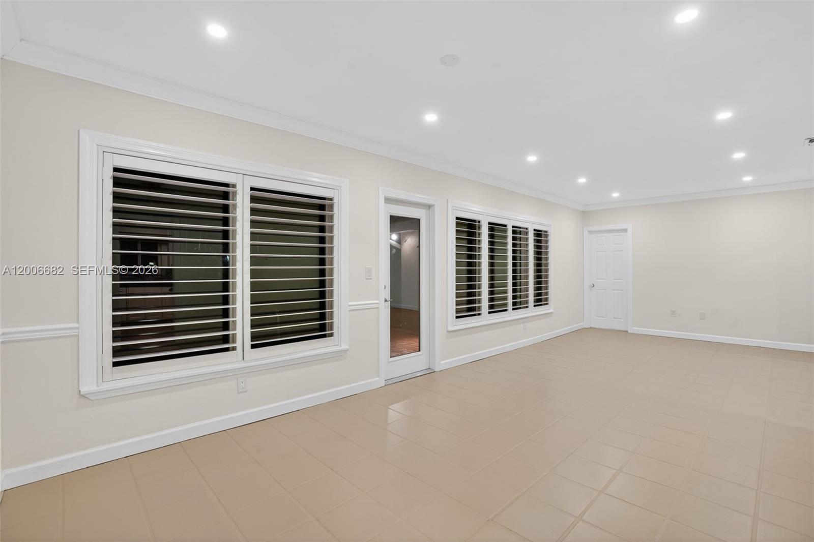 1435 Blue Road Coral Gables, FL 33146 - Photo 10 of 31 a view of an empty room with a window