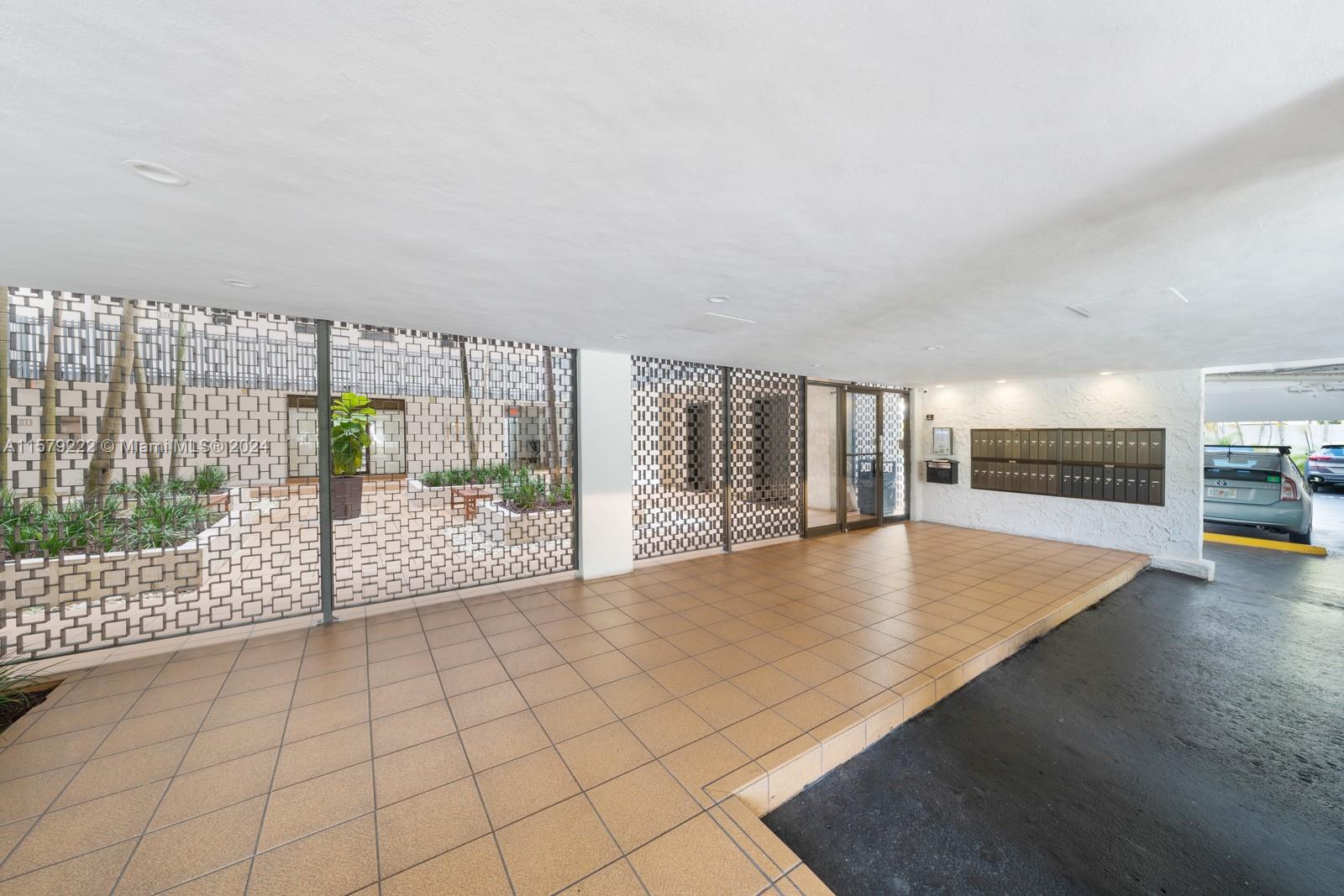 100 Ocean Ln Drive, Unit PH2 Key Biscayne, FL 33149 - Photo 15 of 15 a view of an empty room with a floor to ceiling window and wooden floor