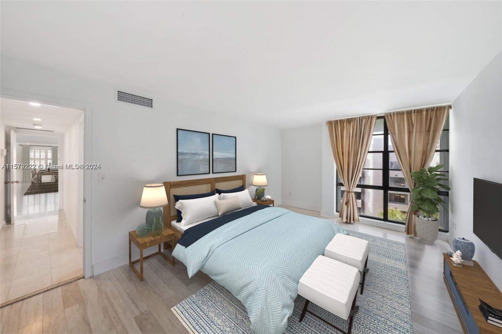 100 Ocean Ln Drive, Unit PH2 Key Biscayne, FL 33149 - Photo 7 of 15 a bedroom with a bed window and a flat screen tv