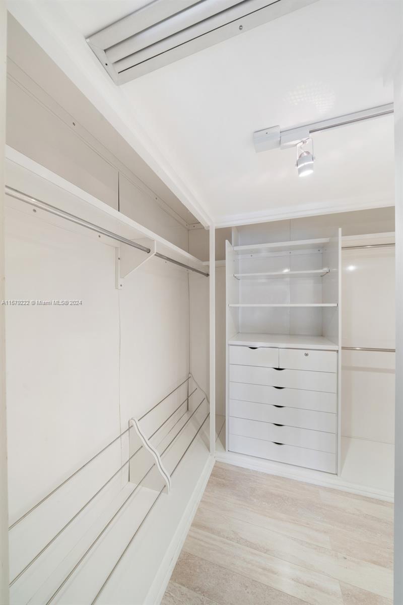 100 Ocean Ln Drive, Unit PH2 Key Biscayne, FL 33149 - Photo 8 of 15 a view of an empty walk in closet