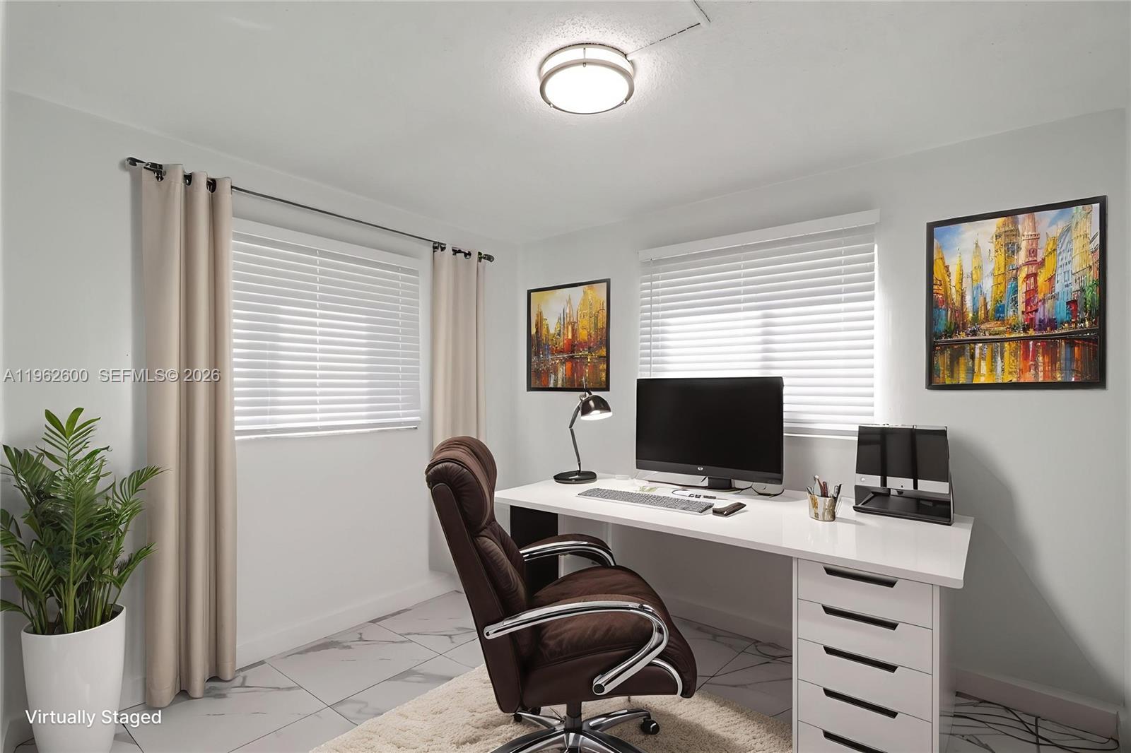 3601 Southwest 2nd Street, Unit 3601 Miami, FL 33135 - Photo 11 of 19 a view of a workspace with furniture and a window