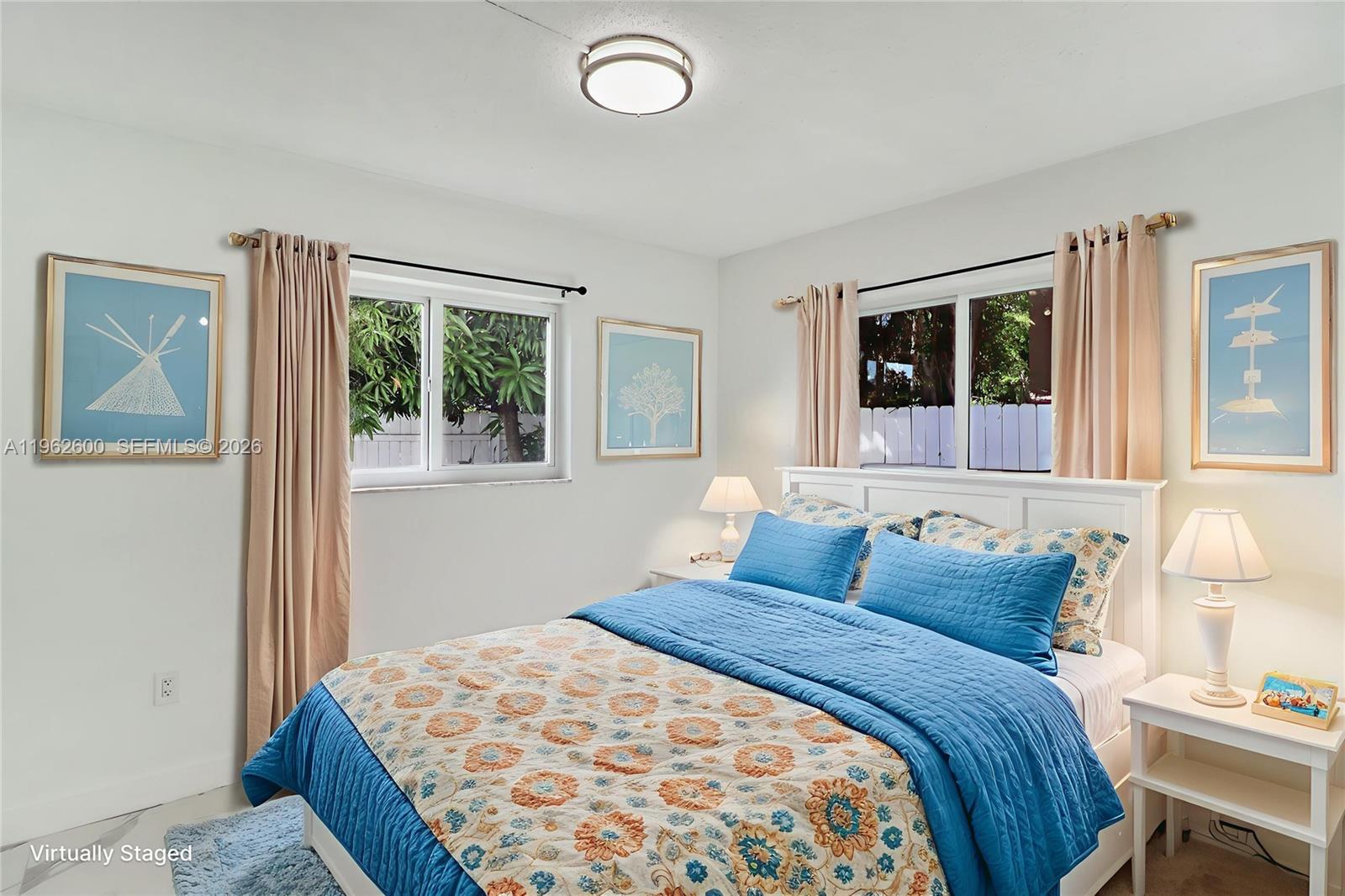 3601 Southwest 2nd Street, Unit 3601 Miami, FL 33135 - Photo 9 of 19 a bedroom with a bed and a window