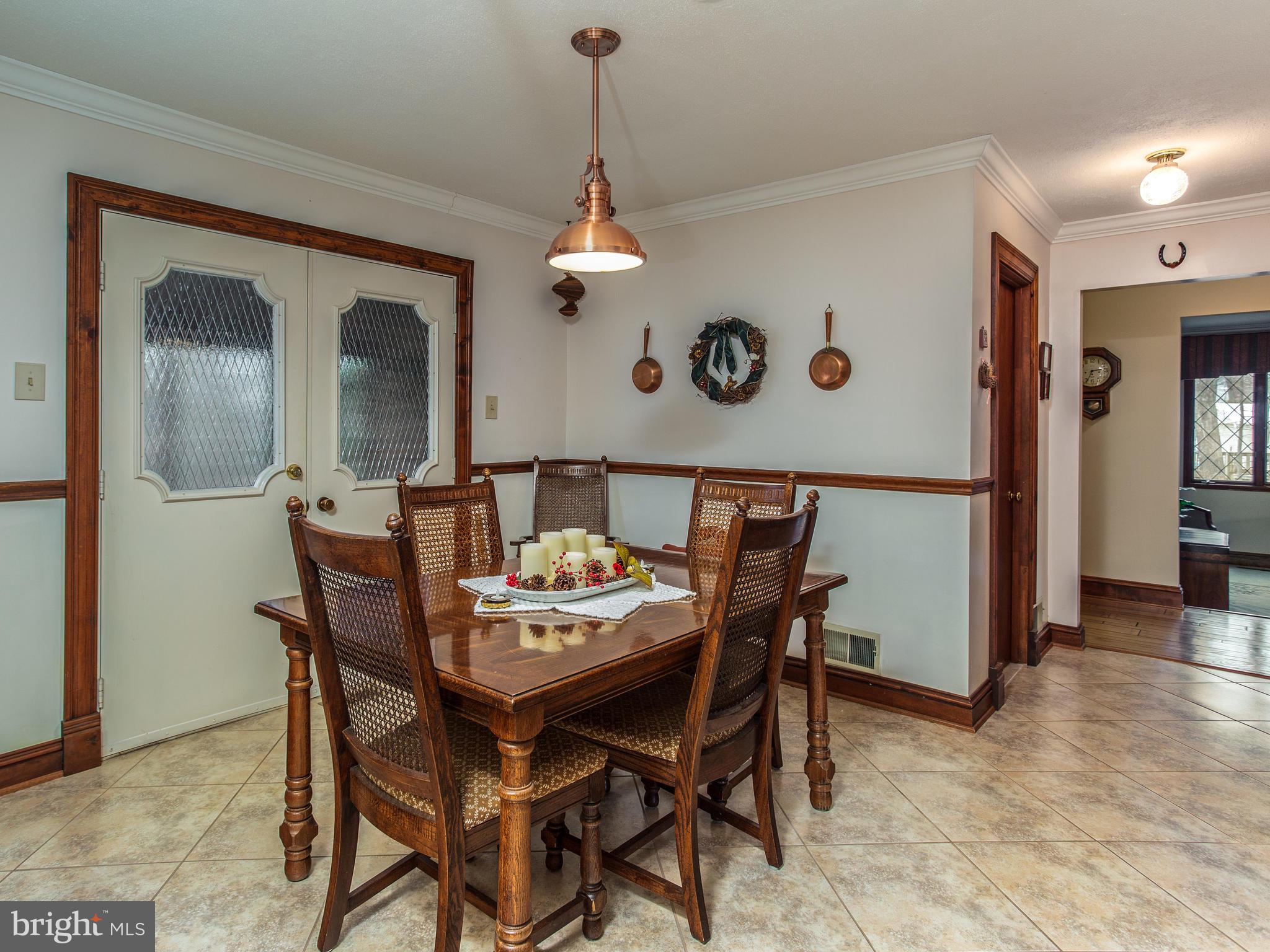 3681 Russell Road Woodbridge, VA 22192 - Photo 20 of 48 Breakfast area adjoining screen porch.