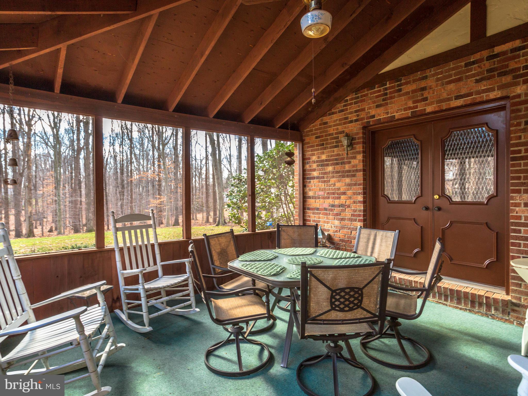 3681 Russell Road Woodbridge, VA 22192 - Photo 22 of 48 Screen Porch with view of wooded back yard.
