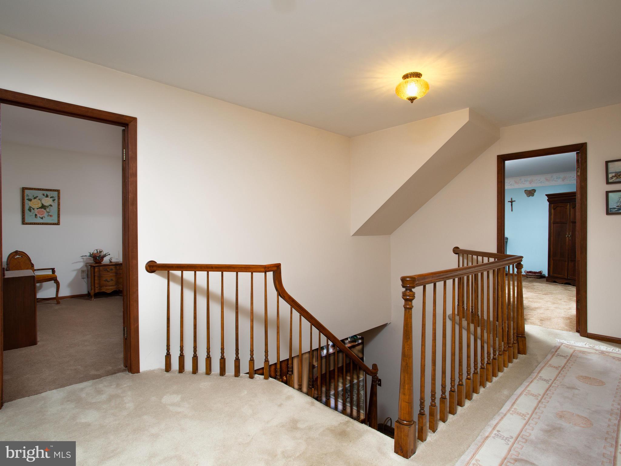 3681 Russell Road Woodbridge, VA 22192 - Photo 29 of 48 Extra-wide staircase upstairs landing.