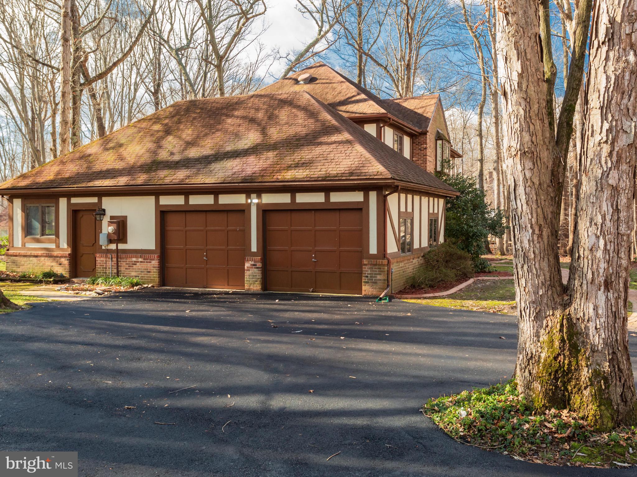 3681 Russell Road Woodbridge, VA 22192 - Photo 6 of 48 Two-car garage with storage above.