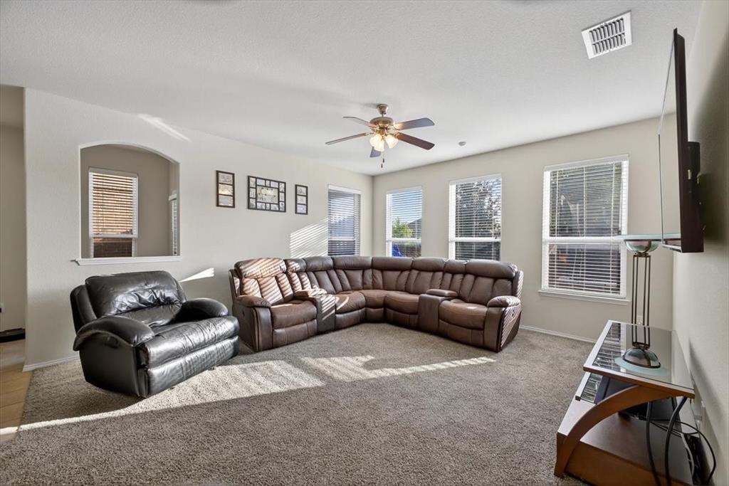 9332 San Tejas Drive Fort Worth, TX 76177 - Photo 12 of 38 a bedroom with furniture and a window