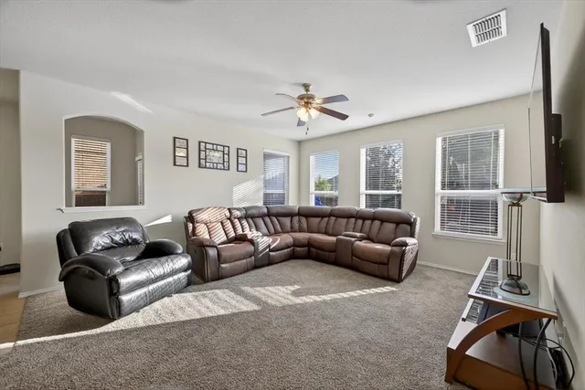 a bed room with a bed and a couch