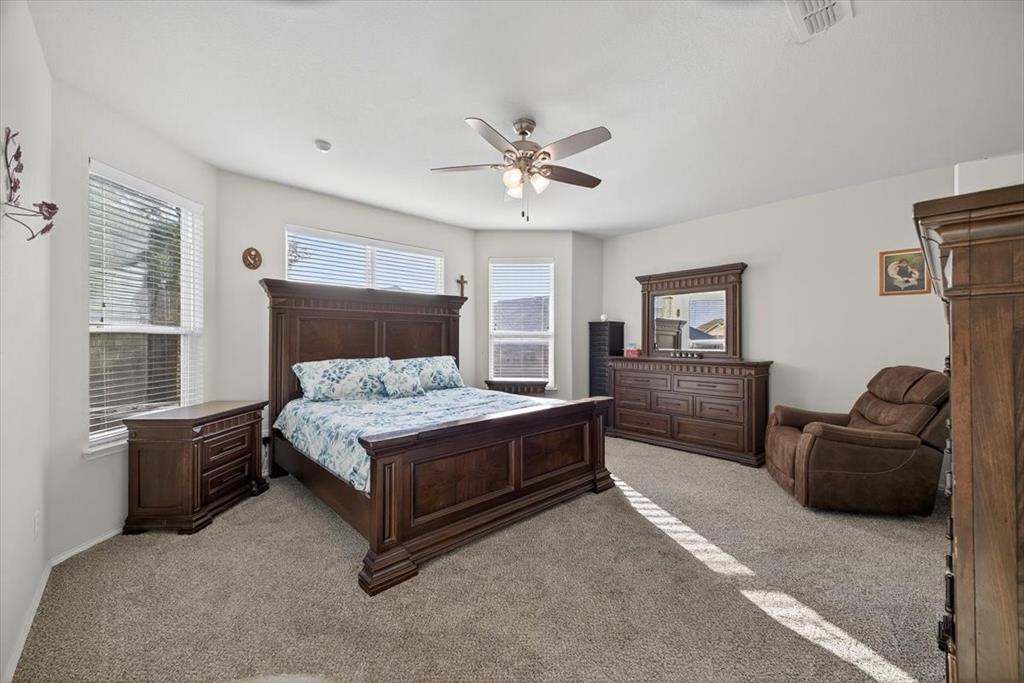 9332 San Tejas Drive Fort Worth, TX 76177 - Photo 13 of 38 a bed room with a bed and a couch