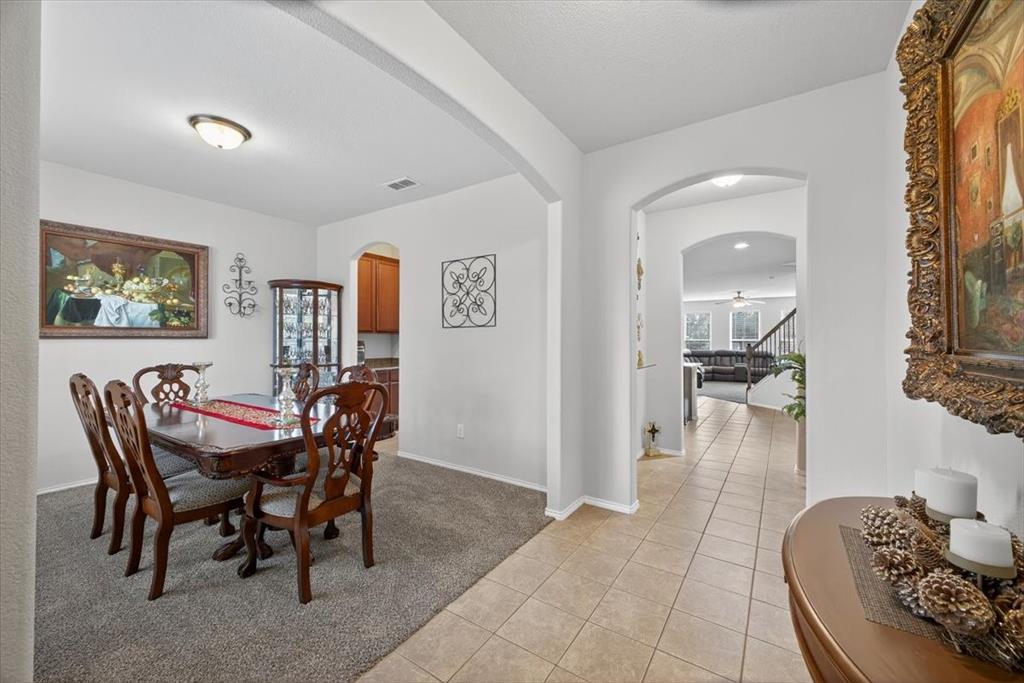9332 San Tejas Drive Fort Worth, TX 76177 - Photo 2 of 38 a view of a dining room with furniture