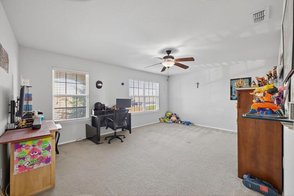 9332 San Tejas Drive Fort Worth, TX 76177 - Photo 25 of 38 a view of a workspace with furniture and a livingroom