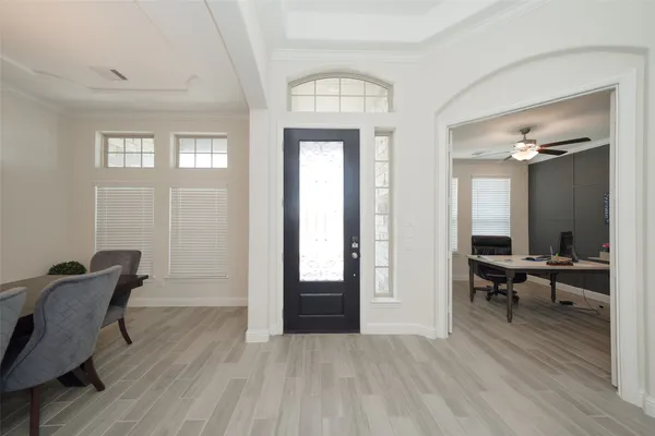 a view of a livingroom with furniture and windows