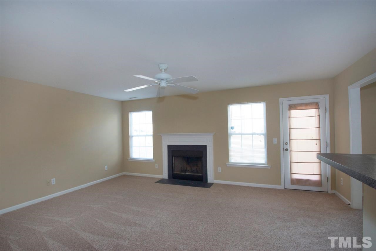 1505 Pebble Ridge Drive Raleigh, NC 27610 - Photo 11 of 23 Wood burning fireplace