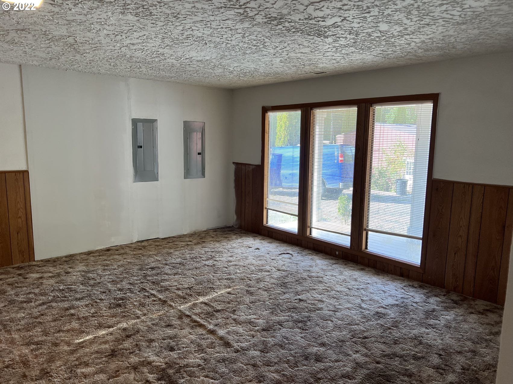 21710 Gooseneck Road Sheridan, OR 97378 - Photo 3 of 32 a view of an empty room with a window