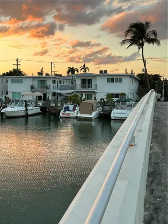 front view of a house and potted plants