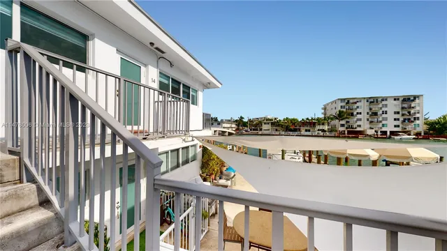 a view of livingroom with furniture wooden floor and windows