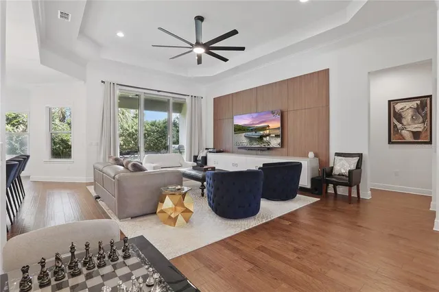 a living room with furniture or couch and a window