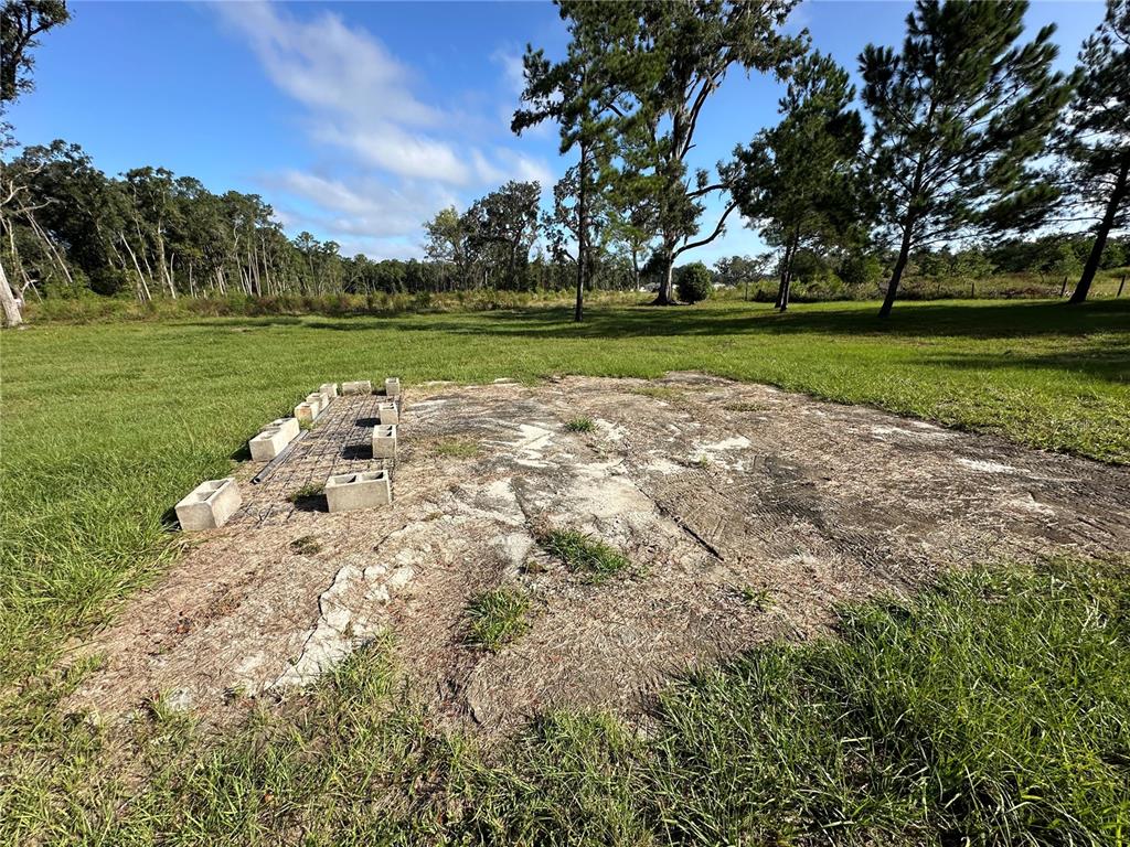 5542 Southwest 57th Avenue Gainesville, FL 32608 - Photo 11 of 15 a view of a golf course with a lake