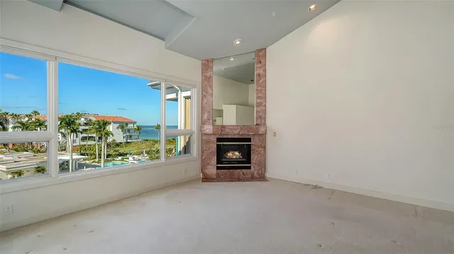 wooden floor in an empty room with a fireplace