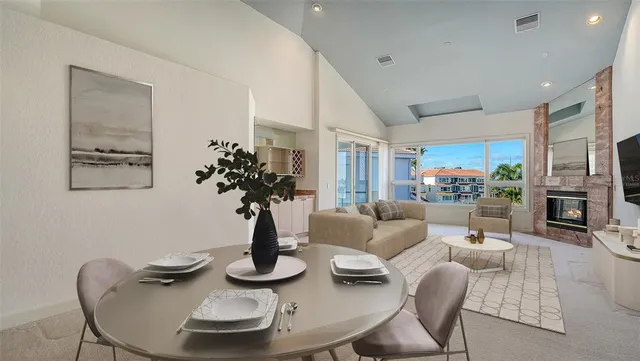a living room with fireplace furniture and a fireplace