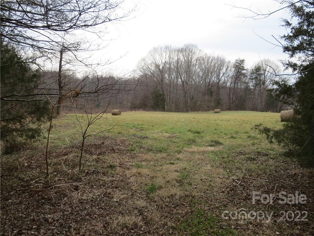 26 Mitchell Farm Road Statesville, NC 28625 - Photo 14 of 23 a view of outdoor space with trees all around