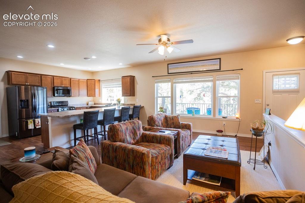 45 Valley Circle Divide, CO 80814 - Photo 7 of 42 a living room with furniture kitchen view and a large window