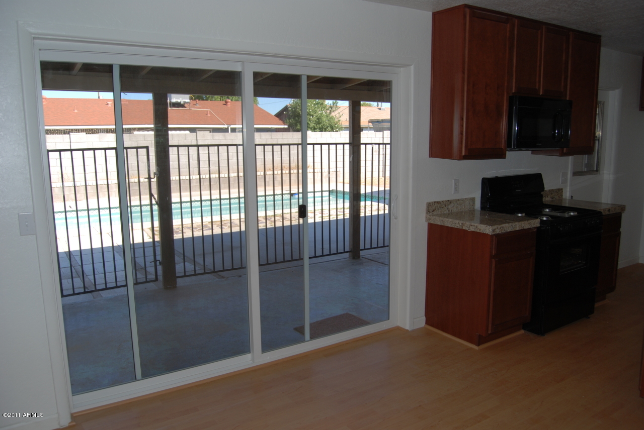 3038 West Wethersfield Road Phoenix, AZ 85029 - Photo 10 of 11 New dual pane low-e sliding doors