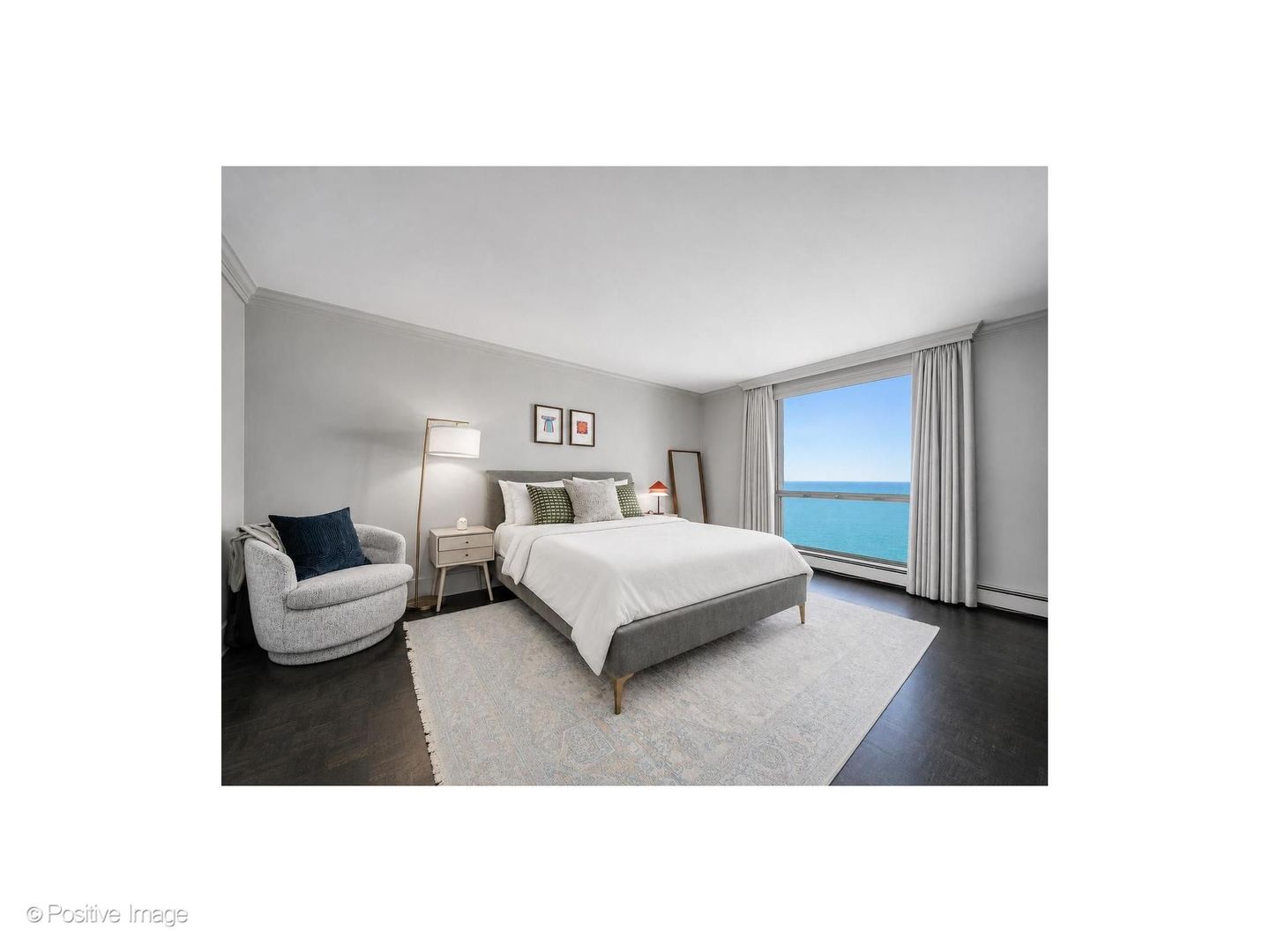 1310 North Ritchie Court, Unit 26C Chicago, IL 60610 - Photo 17 of 34 a bedroom with a bed and a couch