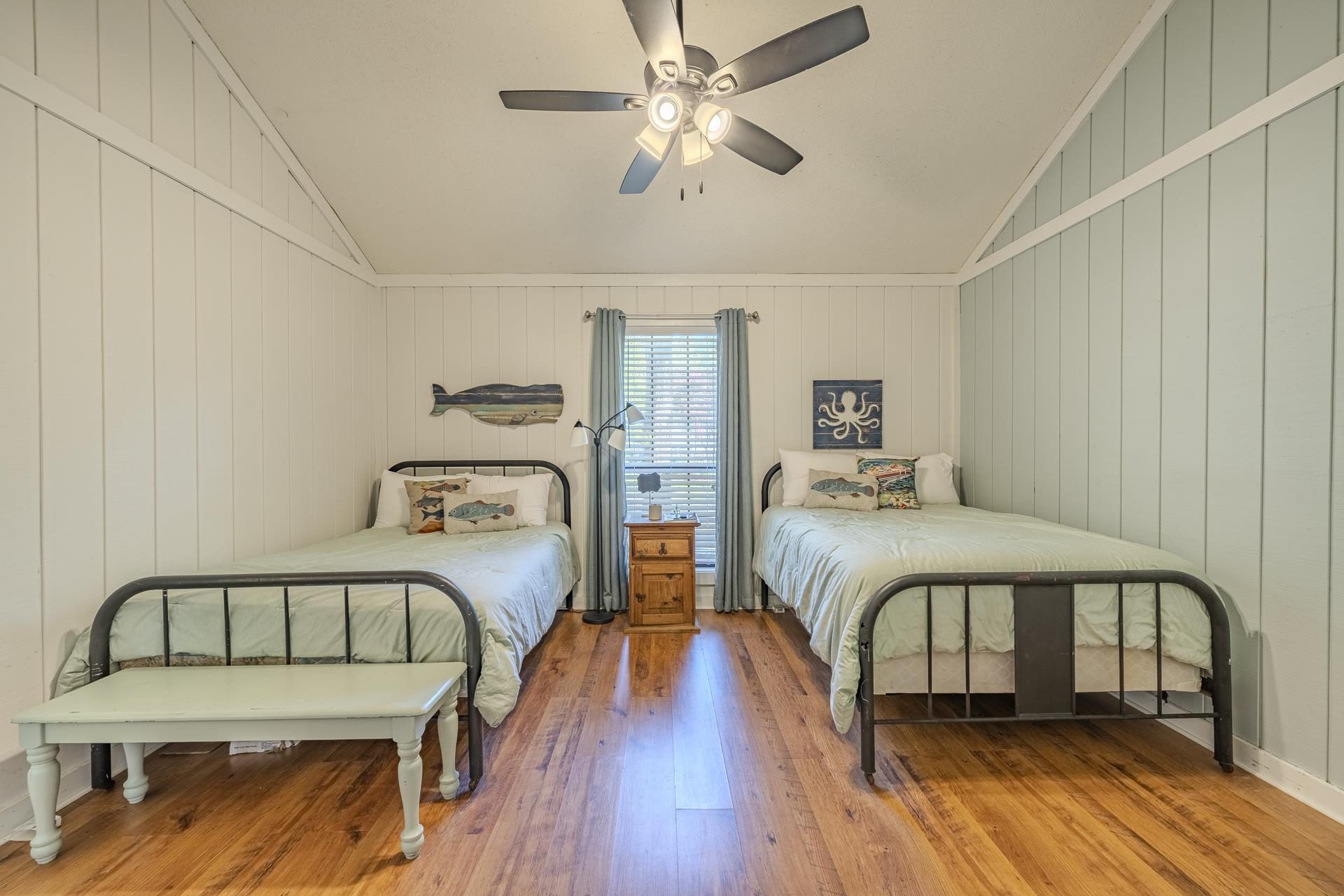 80 Contreau Road Counce, TN 38326 - Photo 18 of 28 a bedroom with two beds and a chandelier
