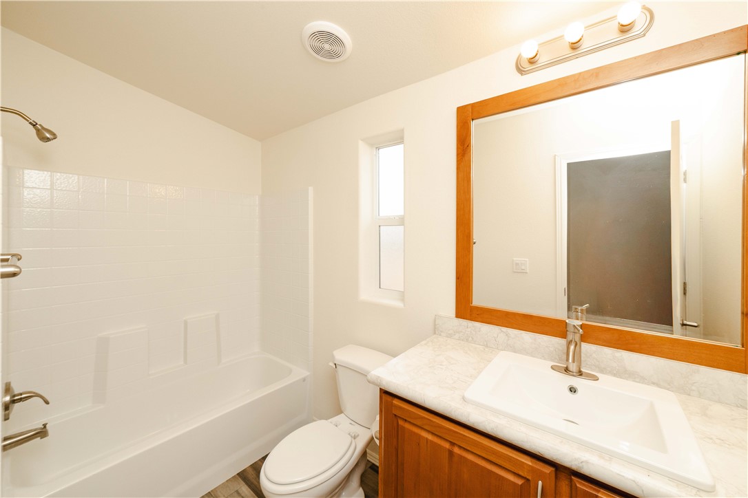 2001 Gold Road Kingman, AZ 86401 - Photo 18 of 57 a bathroom with a sink a toilet and shower