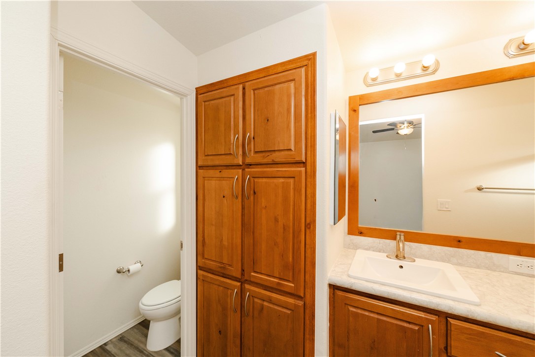 2001 Gold Road Kingman, AZ 86401 - Photo 26 of 57 a bathroom with a sink a toilet and shower