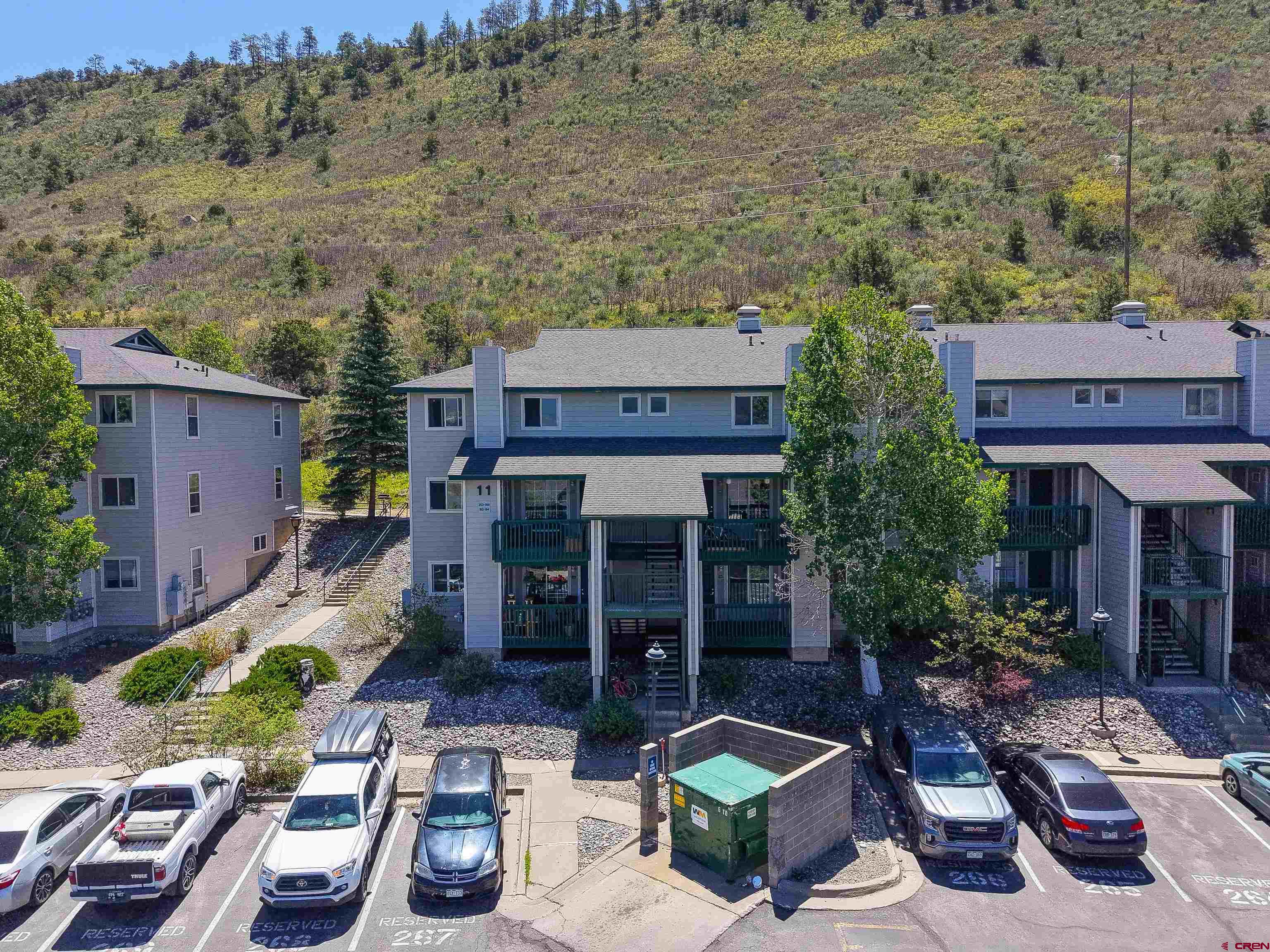 1100 Goeglein Gulch Road, Unit 163 Durango, CO 81301 - Photo 3 of 23 an aerial view of a house with patio