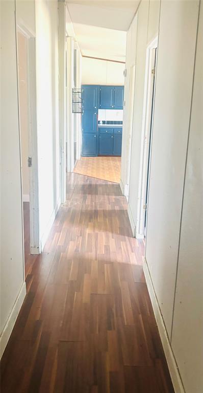 1100 Pecan Ridge Drive Venus, TX 76084 - Photo 11 of 13 Hall with dark wood-type flooring and baseboards
