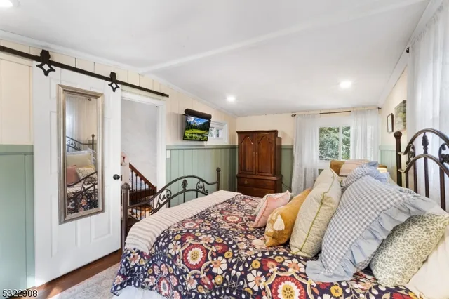 a bedroom with a bed and a closet